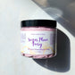Jar of 'Sugar Plum Fairy' shower and shave mousse soap on a white surface